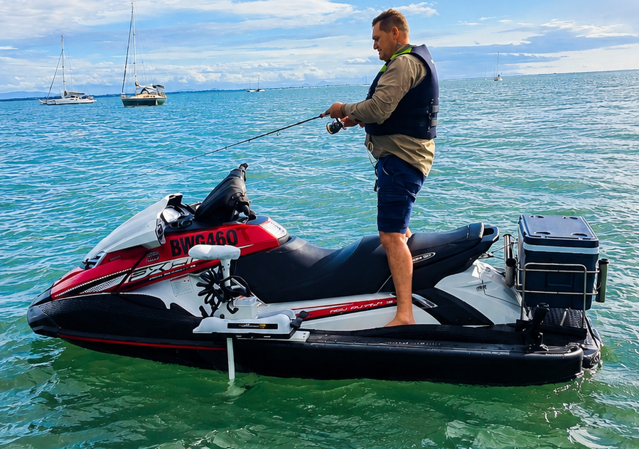 Angler standing and fishing from a Sea-Doo fitted with JFM Gen 4 Collars and Spot Lock