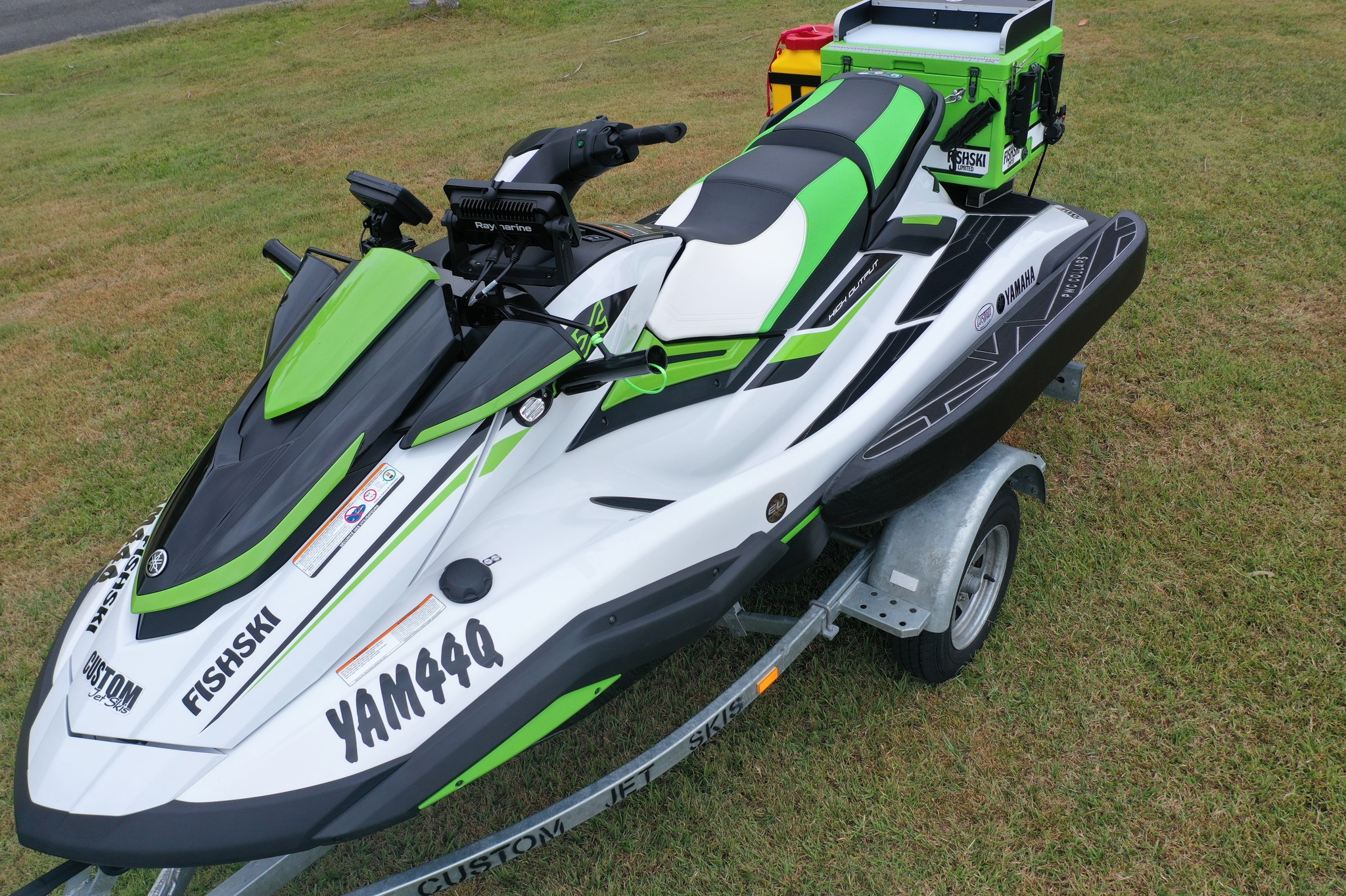 Green and white ski with collars and rear box fitted